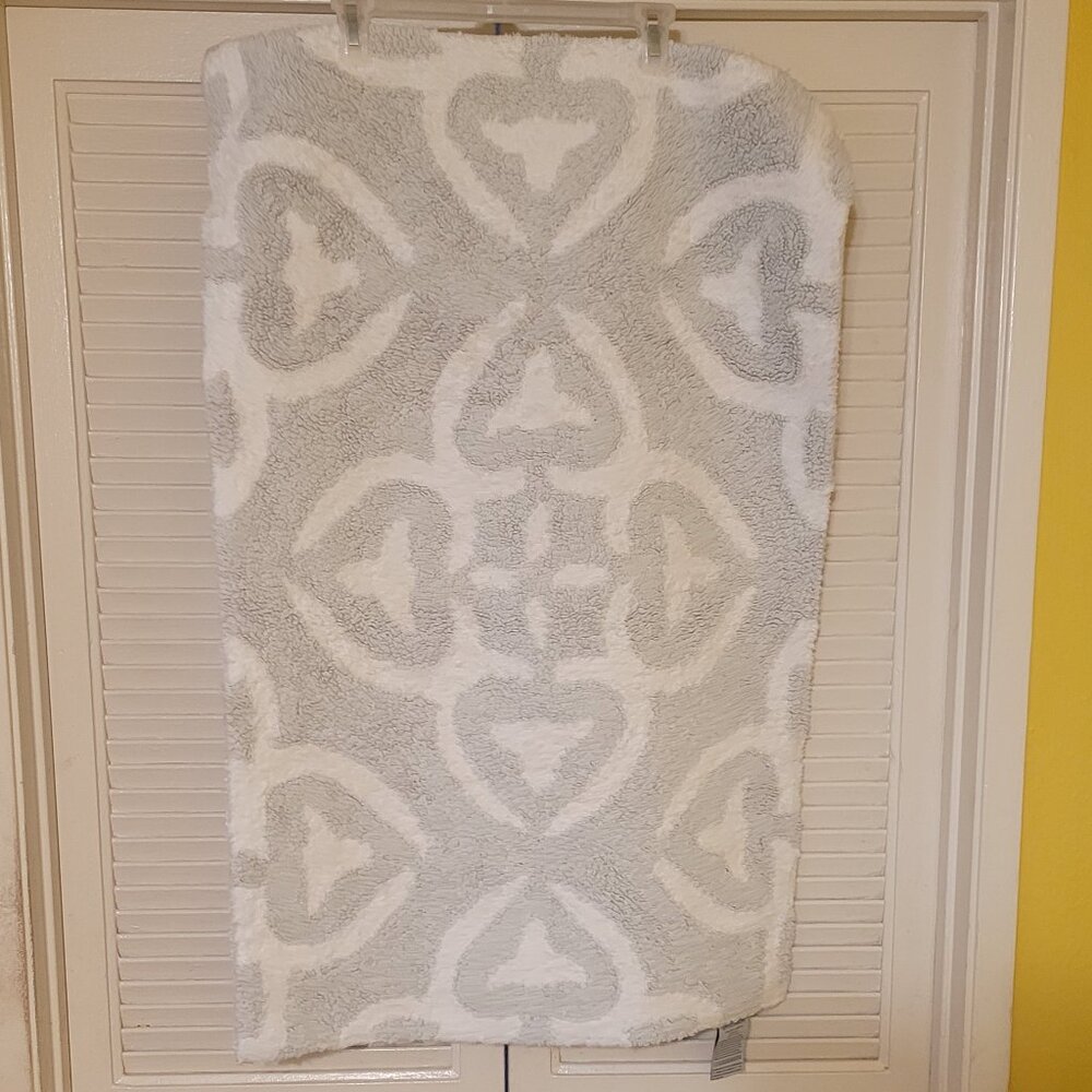 2 Rugs Light Colored with Pattern.